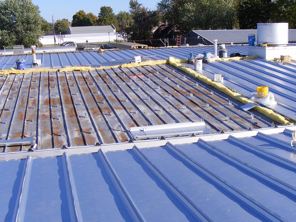 Replacing an old roof with a new metal roof
